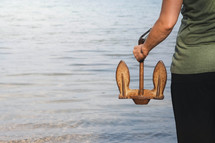 a person holding an anchor