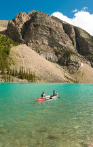 canoe on a mountain lake 
