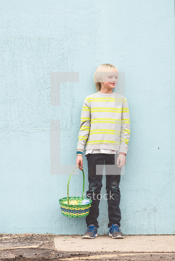 boy child holding an Easter basket  