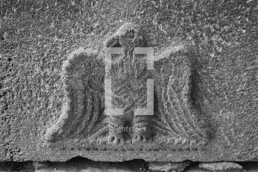 eagle carvings in stone in Umm Qais
