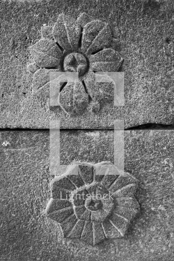 engraved stone flowers 