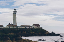 lighthouse and houses 