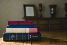 a stack of books for Bible study 