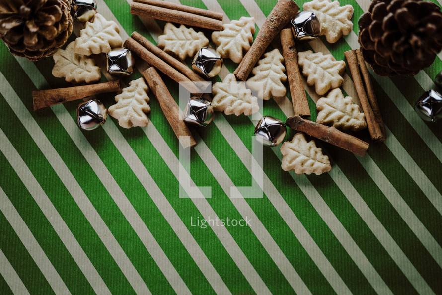 Christmas decor on a green wrapping paper background