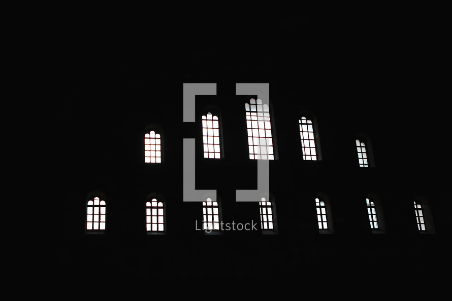 windows in a dark church 