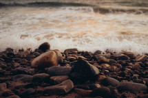 tide washing onto a rocky shore 