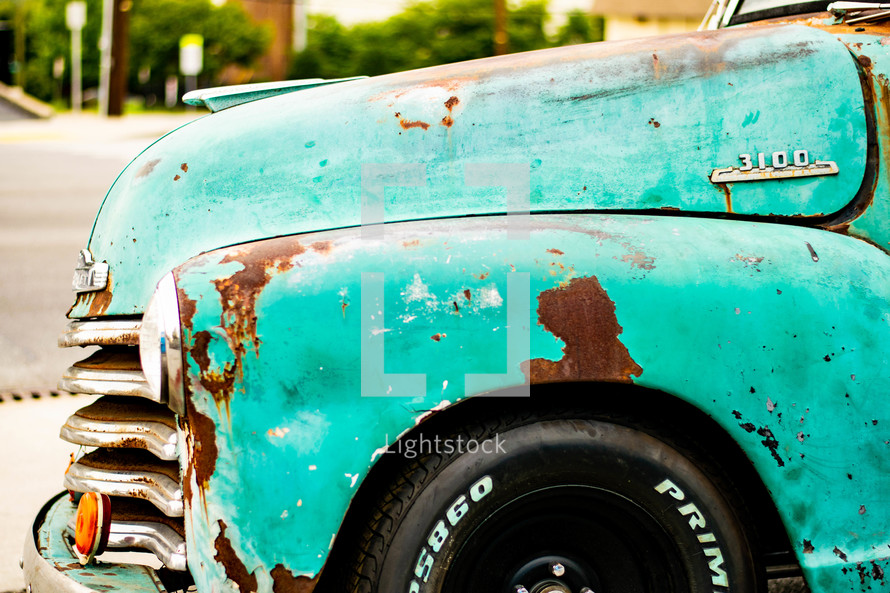 rusty vintage turquoise vehicle 