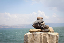 stacked stones by the Sea of Galilee 
