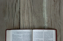 A Bible opened to 1 Thessalonians 