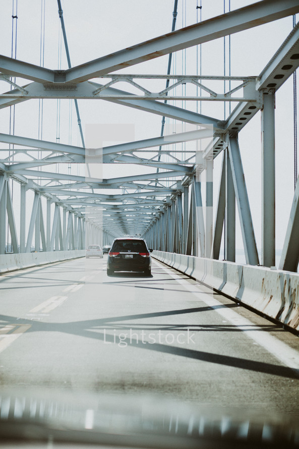 cars crossing a bridge 