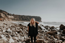 woman standing on a rocky beach in Palos Verdes 