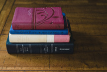 a stack of books for Bible study 