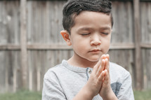 praying boy