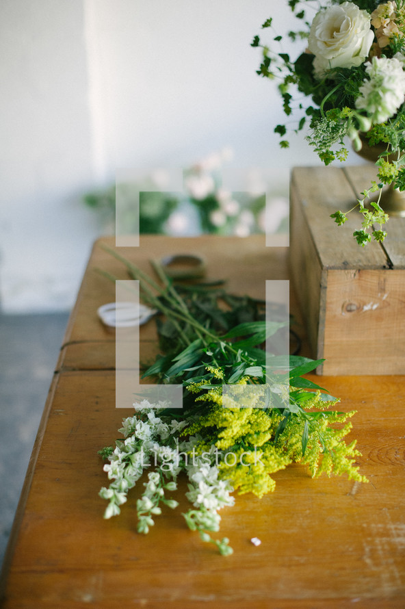 arranging flowers in a vase 