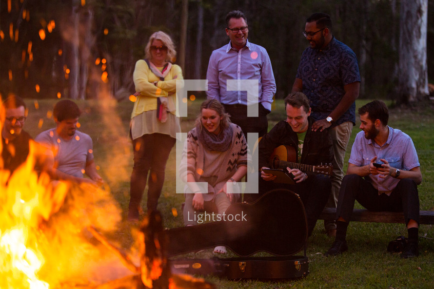 social gathering around a bonfire 