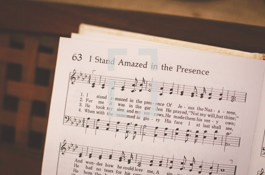 I stand amazed in his presence 