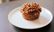 pecan muffin on a plate 