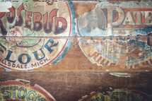 Old logos on wood wall
