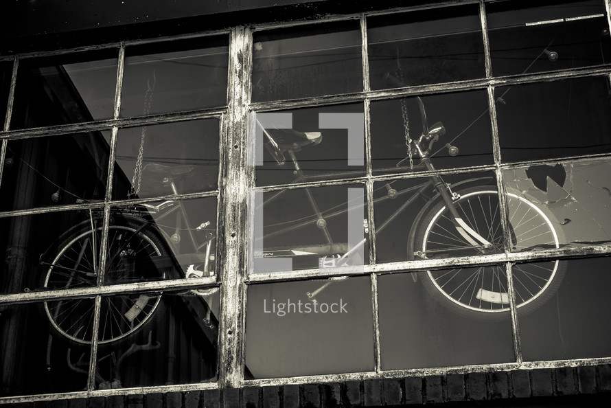 bicycle hanging in a shop window 