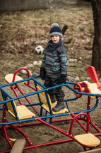 boy playing on a playground 