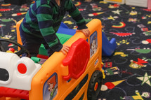 kid playing in a nursery 