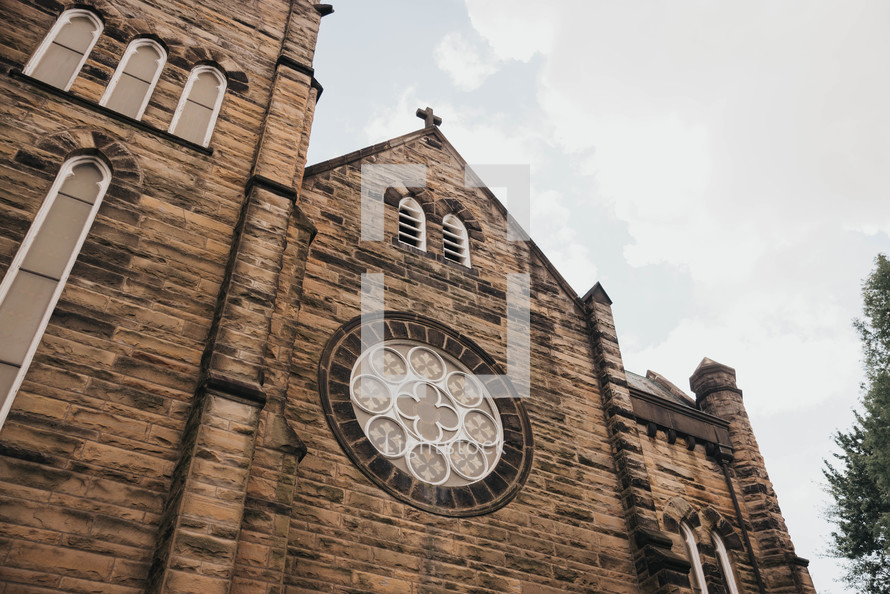 the outside of an old catholic church building