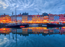 Famous old Nyhavn port in the center of Copenhagen, Denmark during summer night