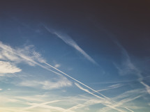 plane contrails in the sky 