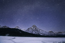 night sky over a winter landscape 