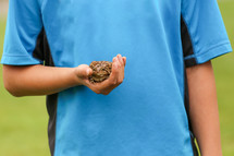 boy holding a toad 