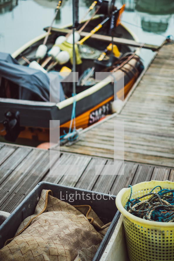 ropes in buckets on docks 