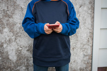 a child playing a game app on a cellphone 