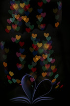Colorful glowing hearts.