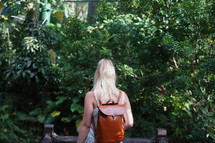 a woman backpacking in the jungle 