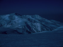 icy mountains at night 