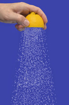 Conceptual Water Flowing Shower From Squeeze Half Of A Lemon