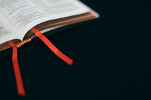 ribbon bookmark and pages of a Bible 
