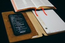 Bible app, pages of a Bible, and journal 