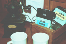 vintage phone and coffee mugs 