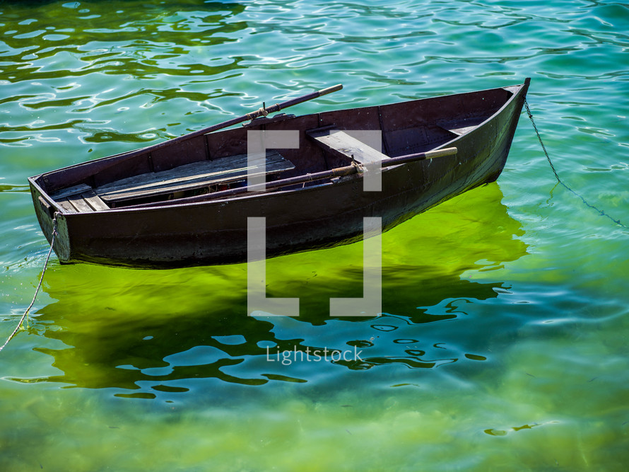 boat on green water 