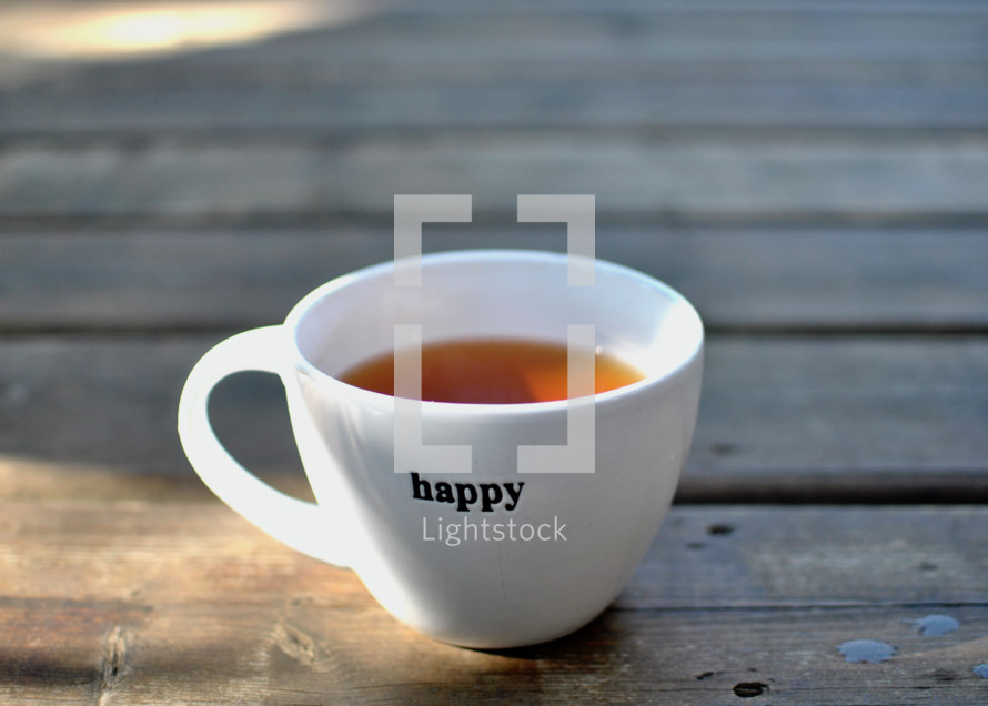 coffee cup with the word happy 