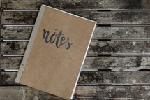 word notes on a notebook cover 
