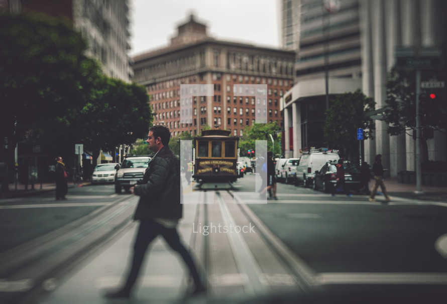 Man crossing street in San Francisco 