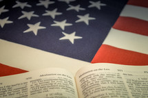 Open Bible on an American flag - Meditation on the Law 