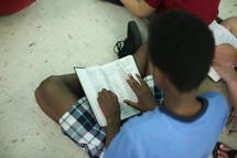 children reading Bibles 