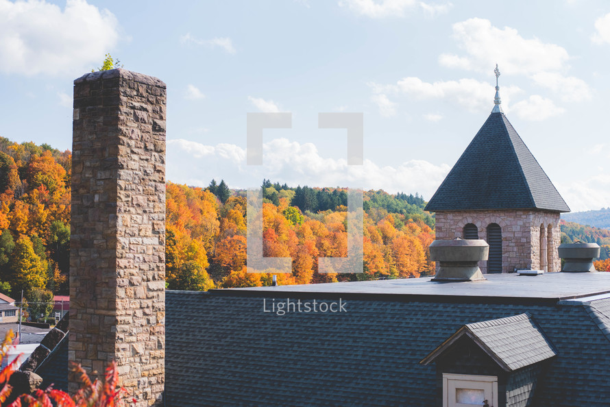 church roof and fall trees 