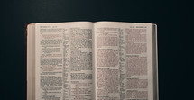pages of an opened Bible turned to Matthew 