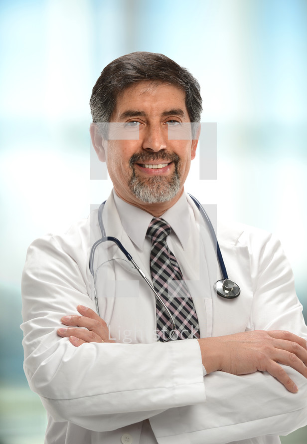 doctor with a stethoscope around his neck 