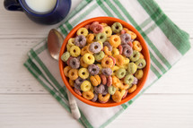 Bowl of Fruit Cereal on a Rustic Wooden Table
