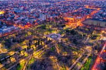 Aerial view of Galati City, Romania, at sunset with city lights on